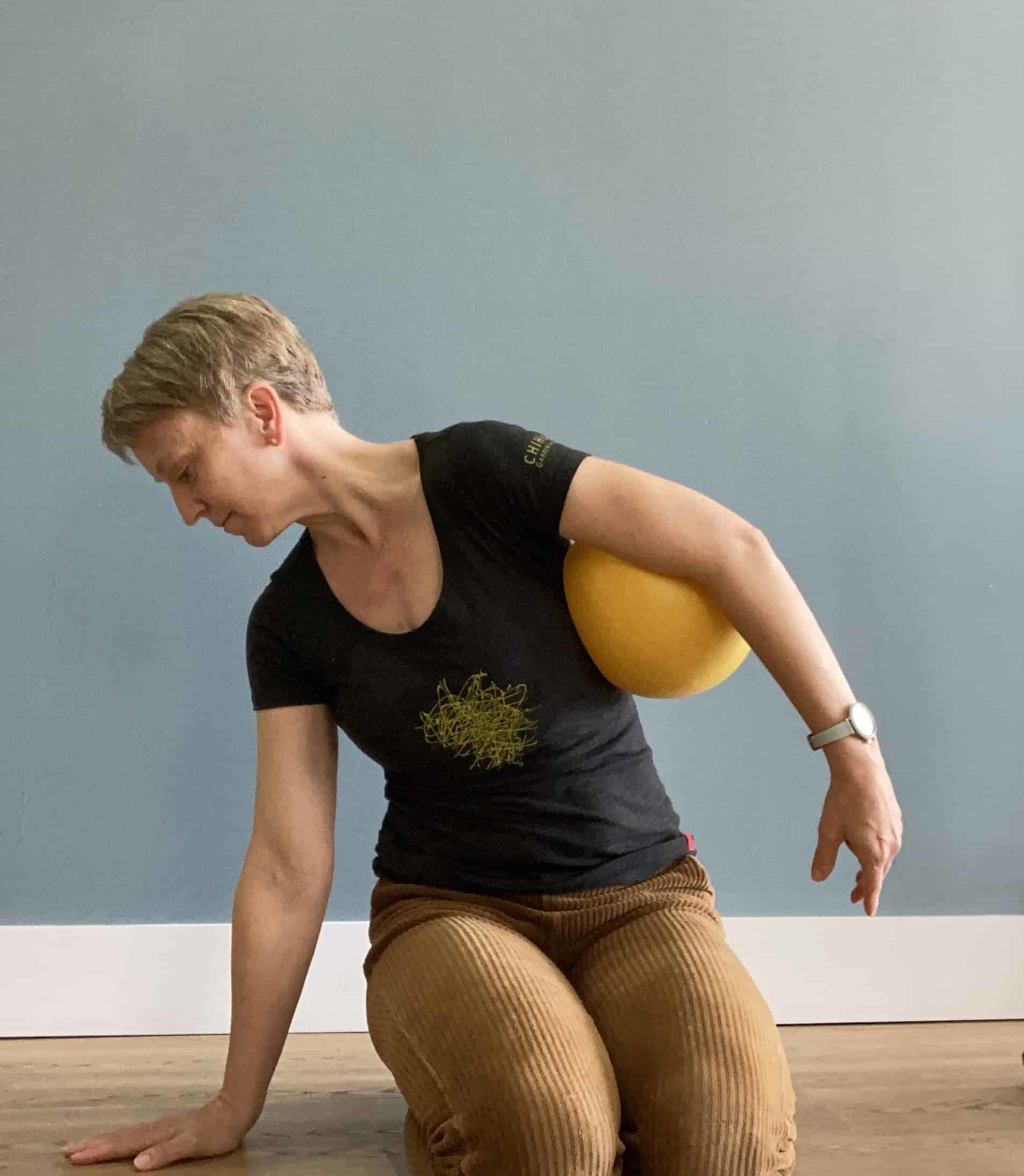 Supported Side Bend Laura Helsel, Pilates Process Owner, Demonstrates Pilates Rotator Cuff Remedies