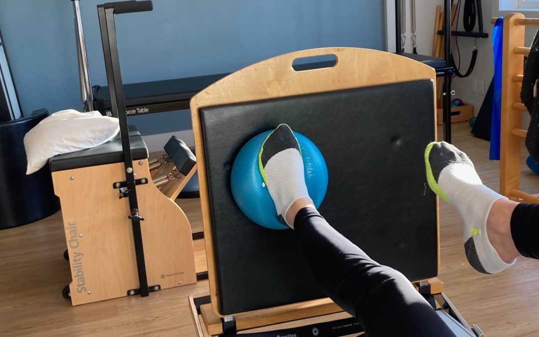 Footwork on Pilates Reformer. Jumpboard with Foot on Ball